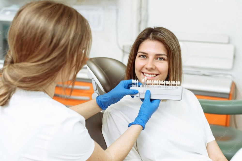 a woman is getting dental treatemnt